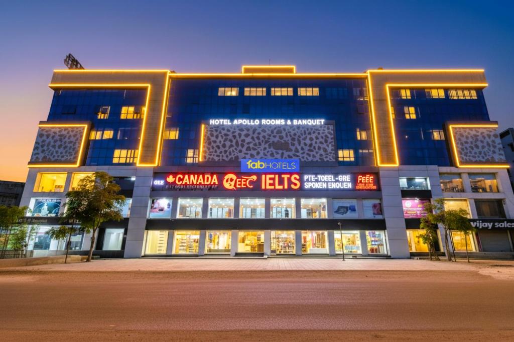 a large blue building with neon signs on it at Via Apollo - Nr Odhav Ring Road in Naroda