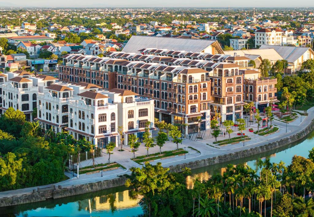 an aerial view of a city with buildings at Lumiere Boutique Vỹ Dạ in Thôn Lại Thê