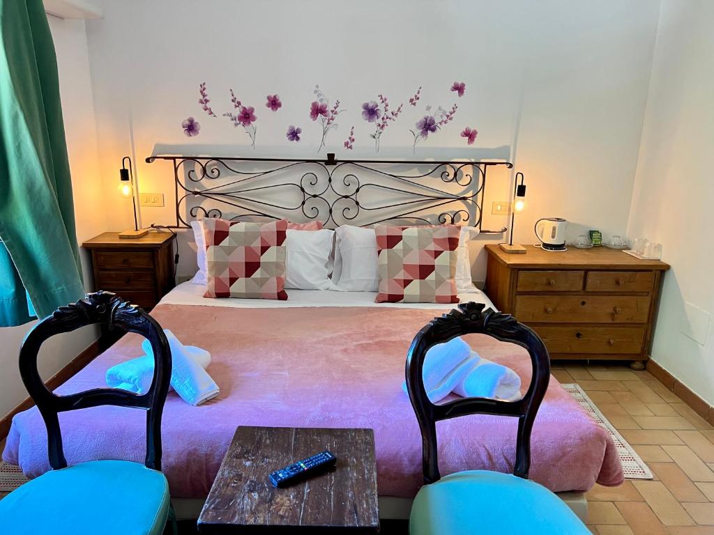 Postel nebo postele na pokoji v ubytování Agriturismo Podere La Fornace