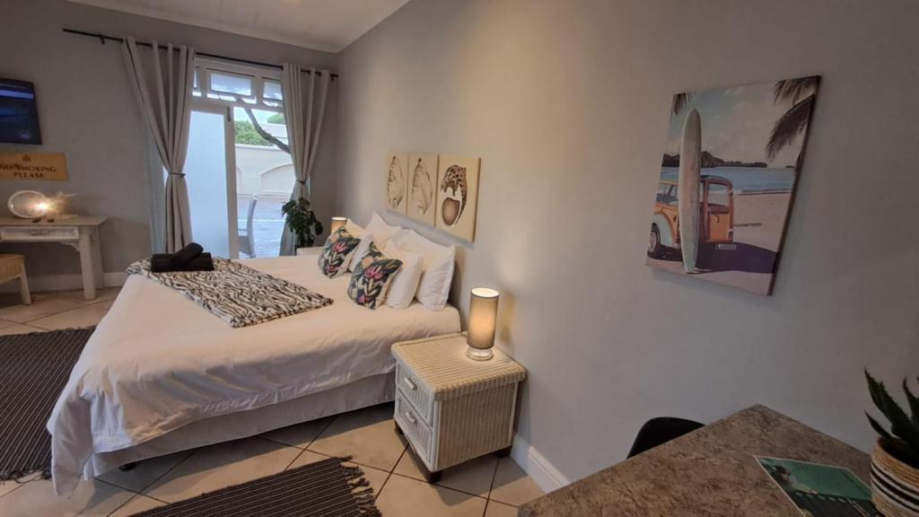 Ένα ή περισσότερα κρεβάτια σε δωμάτιο στο Seaside at The Dunes