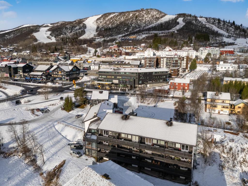an aerial view of a town in the snow at Geilo Town Centre - Apartment with a Superb Location and walking Distance to Everything in Geilo