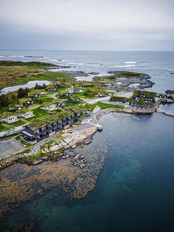an aerial view of a resort in the ocean at Hustadvika Havhotell - by Classic Norway Hotels in Farstad