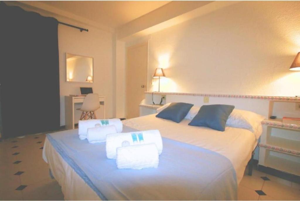 Postel nebo postele na pokoji v ubytování Mogador beach - HOME RENT MALAGA