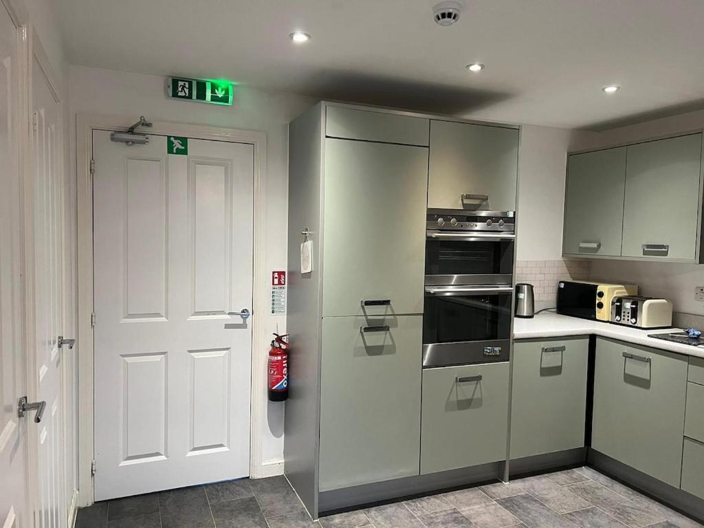 Køkken eller tekøkken på Beautiful 4-bedroom house