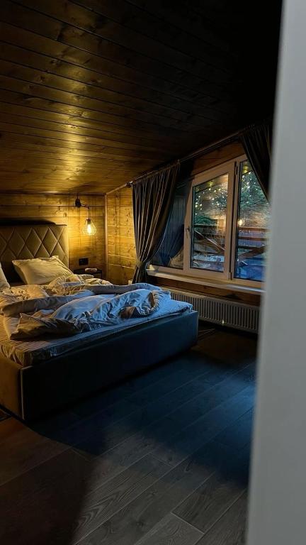 Giường trong phòng chung tại Vilighouse