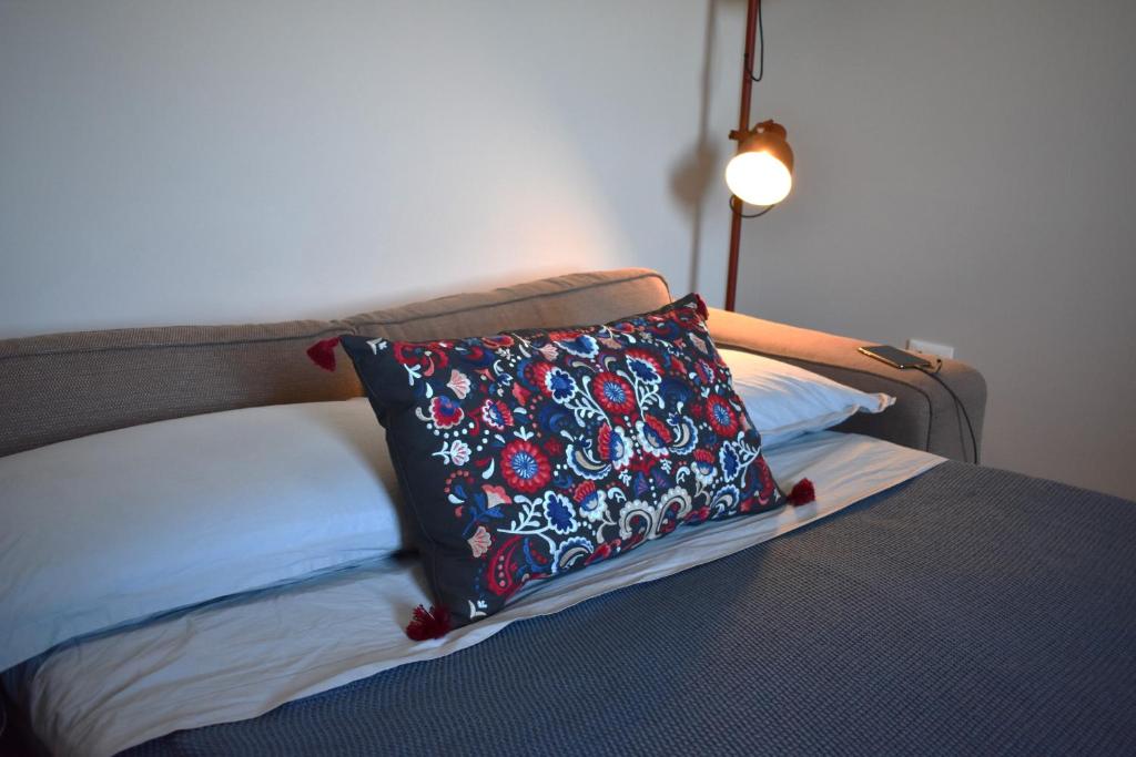 Postel nebo postele na pokoji v ubytování Podere Centoquattro - Appartamento "Il Blu"