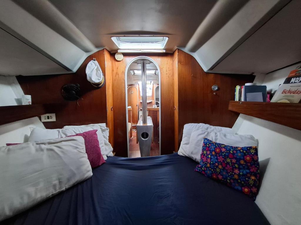 Postel nebo postele na pokoji v ubytování Clásico velero en San Blas