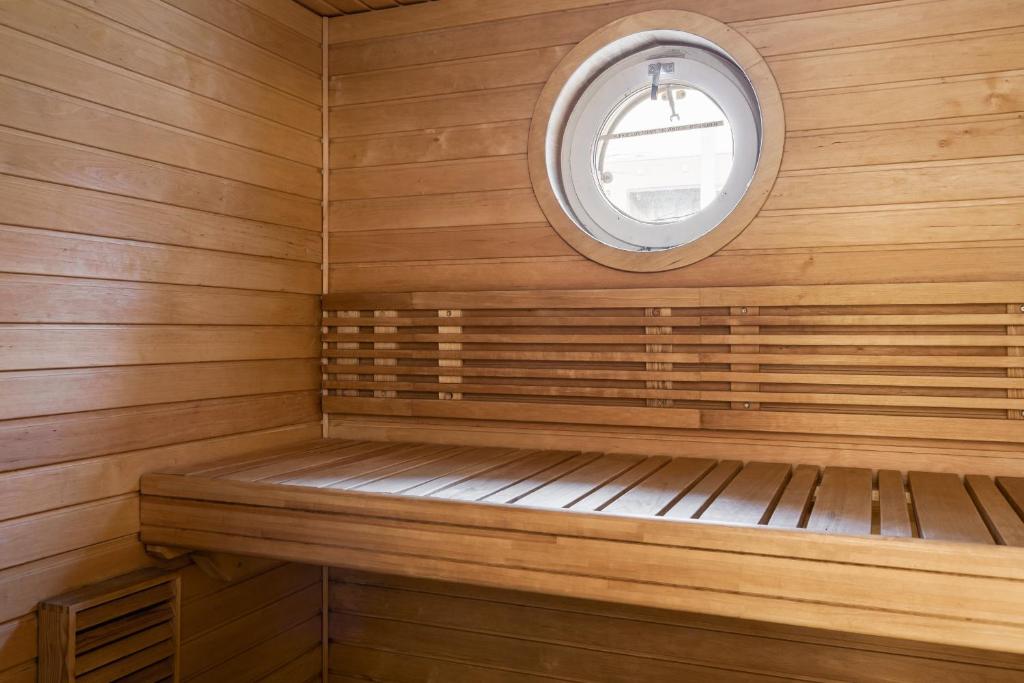 Spacious 2BR City Retreat with Private Sauna photo