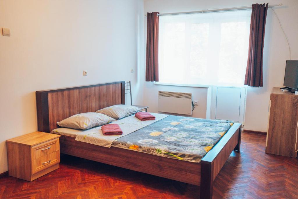 Кровать или кровати в номере Apartment in the city center