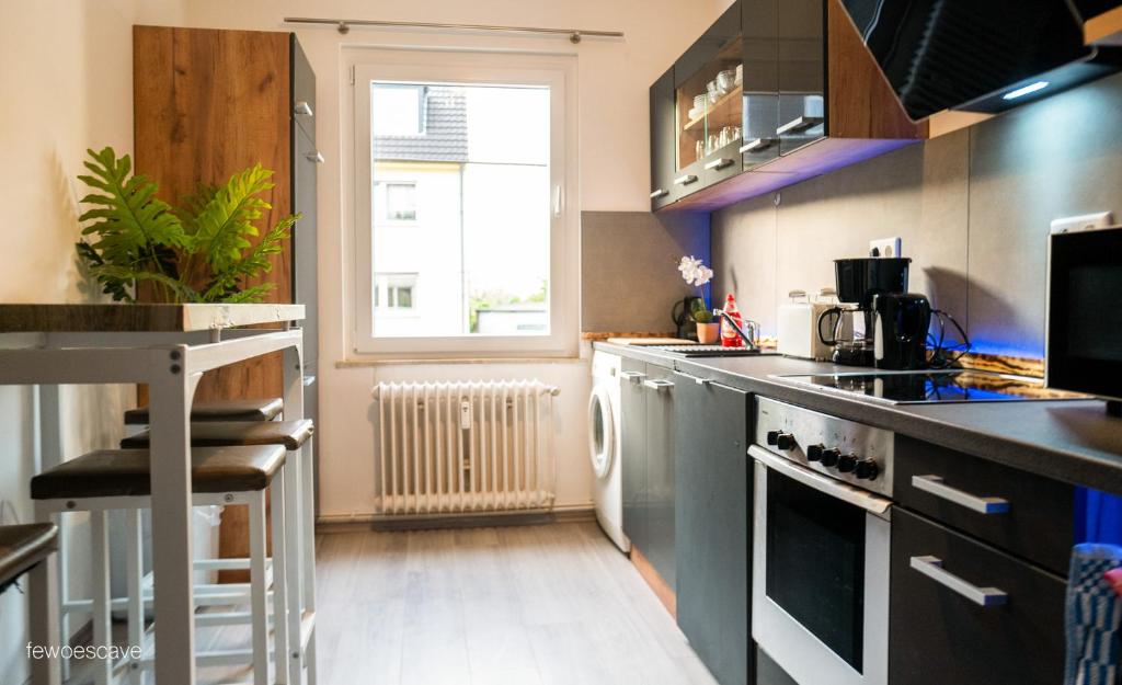 Η κουζίνα ή μικρή κουζίνα στο Gemütliche und komfortable Wohnung für 6 P