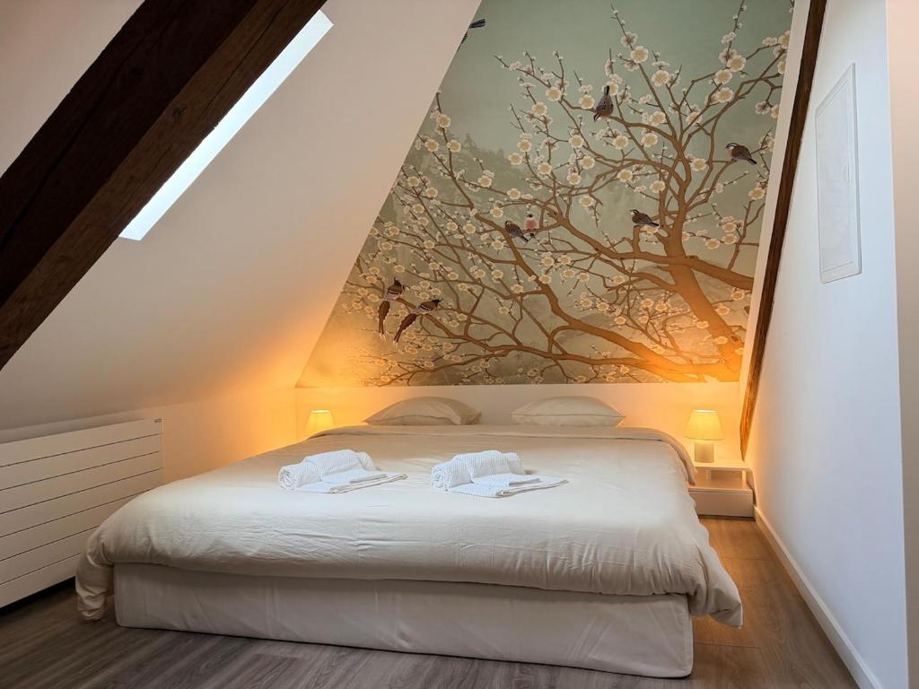 Giường trong phòng chung tại Bird Suite