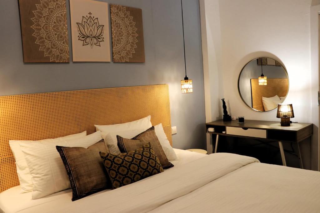 Postel nebo postele na pokoji v ubytování Zen Loft Getaway