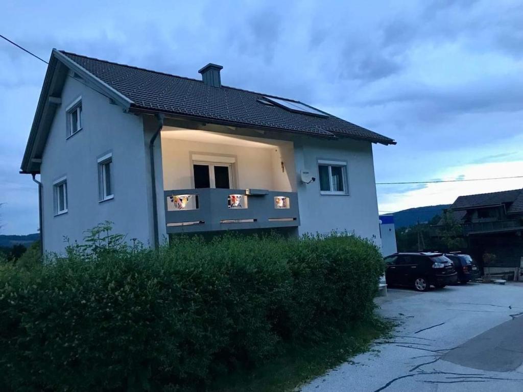 a house with lights on the side of it at Rosental Privatunterkunft in Sankt Margareten im Rosental