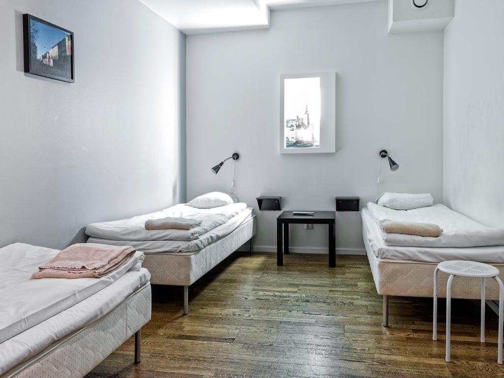 Postel nebo postele na pokoji v ubytování Mosebacke Hostel