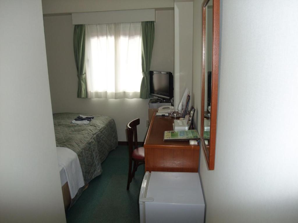 Postel nebo postele na pokoji v ubytování Hotel Tateshina