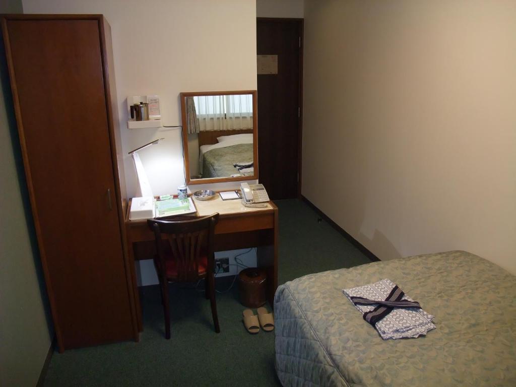Postel nebo postele na pokoji v ubytování Hotel Tateshina