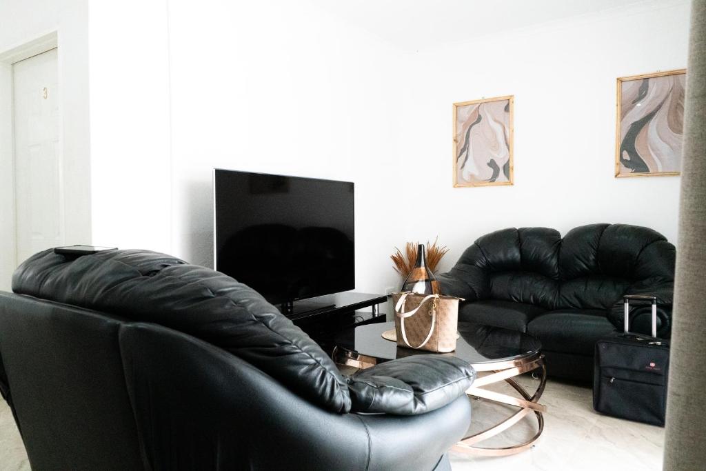 TV a/nebo společenská místnost v ubytování Stratford Haven