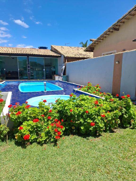 Bazén v ubytování Suítes Vila das Ondas Búzios nebo v jeho okolí