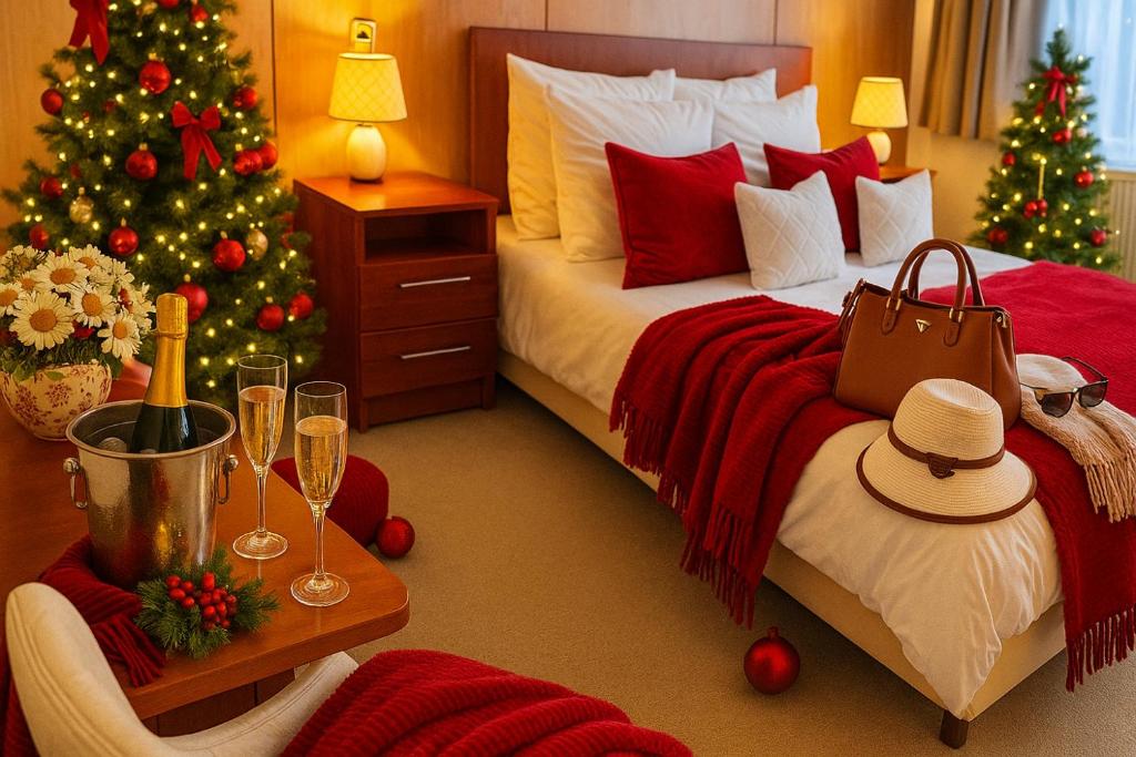 a bedroom with a christmas tree and a bed at Plaza Hotel Gyula in Gyula