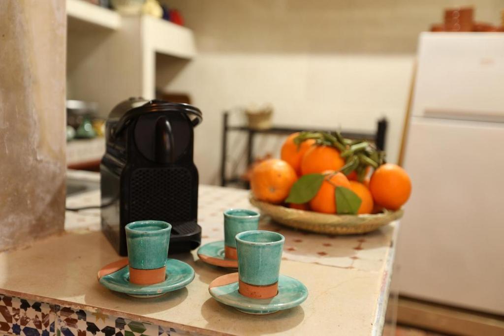 Kuchyň nebo kuchyňský kout v ubytování Riad dar lfen Chambre twin