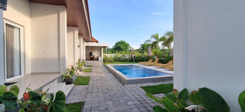 Πισίνα στο ή κοντά στο Umah D'Kancagan