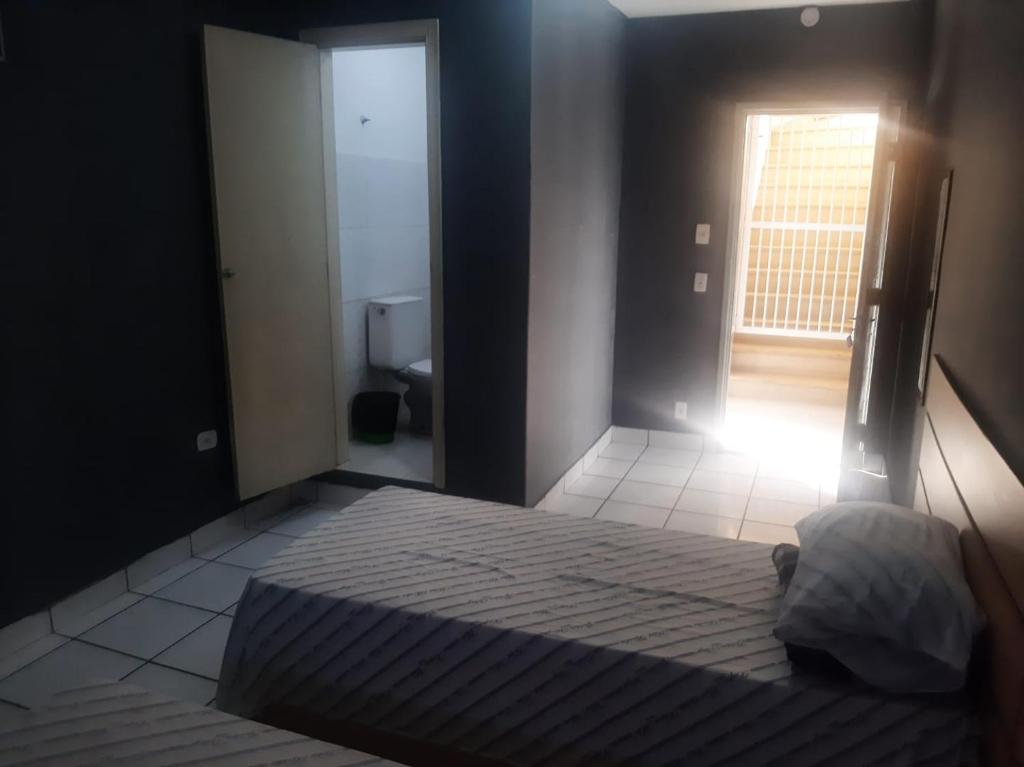 Ένα ή περισσότερα κρεβάτια σε δωμάτιο στο Hotel Vitória Palace