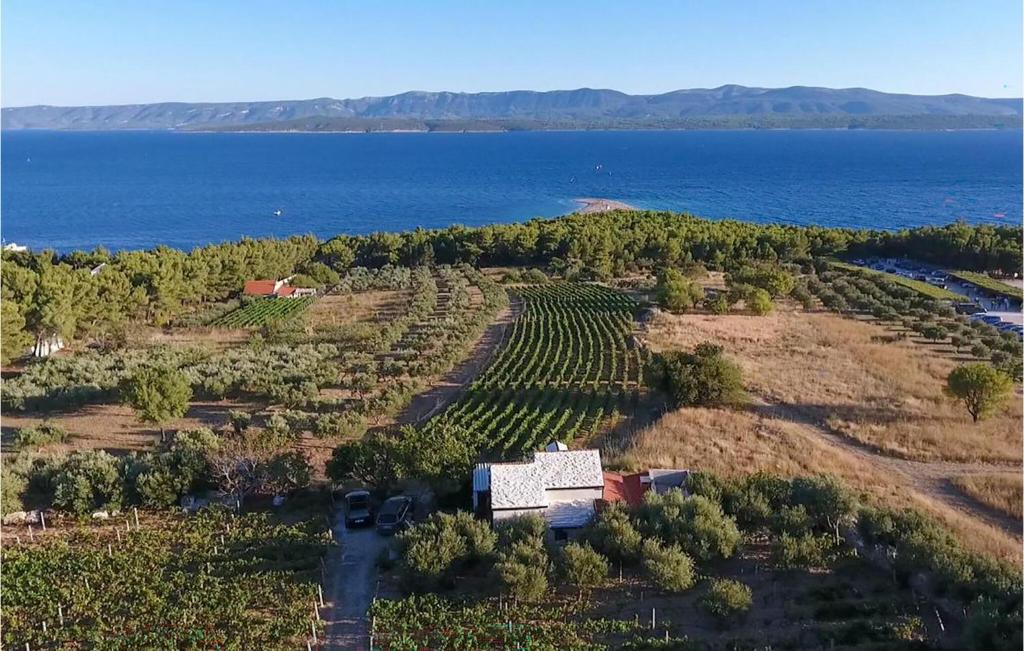 an aerial view of a farm near the water at Beautiful Home In Bol in Bol