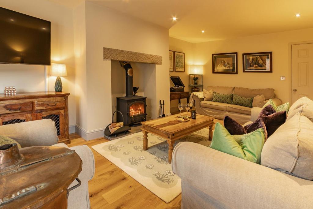 Et opholdsområde på STAXTON COACH HOUSE dog friendly with garden