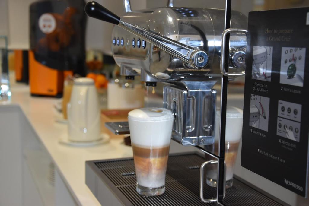 Příslušenství pro přípravu čaje a kávy v ubytování Hotel City Locarno
