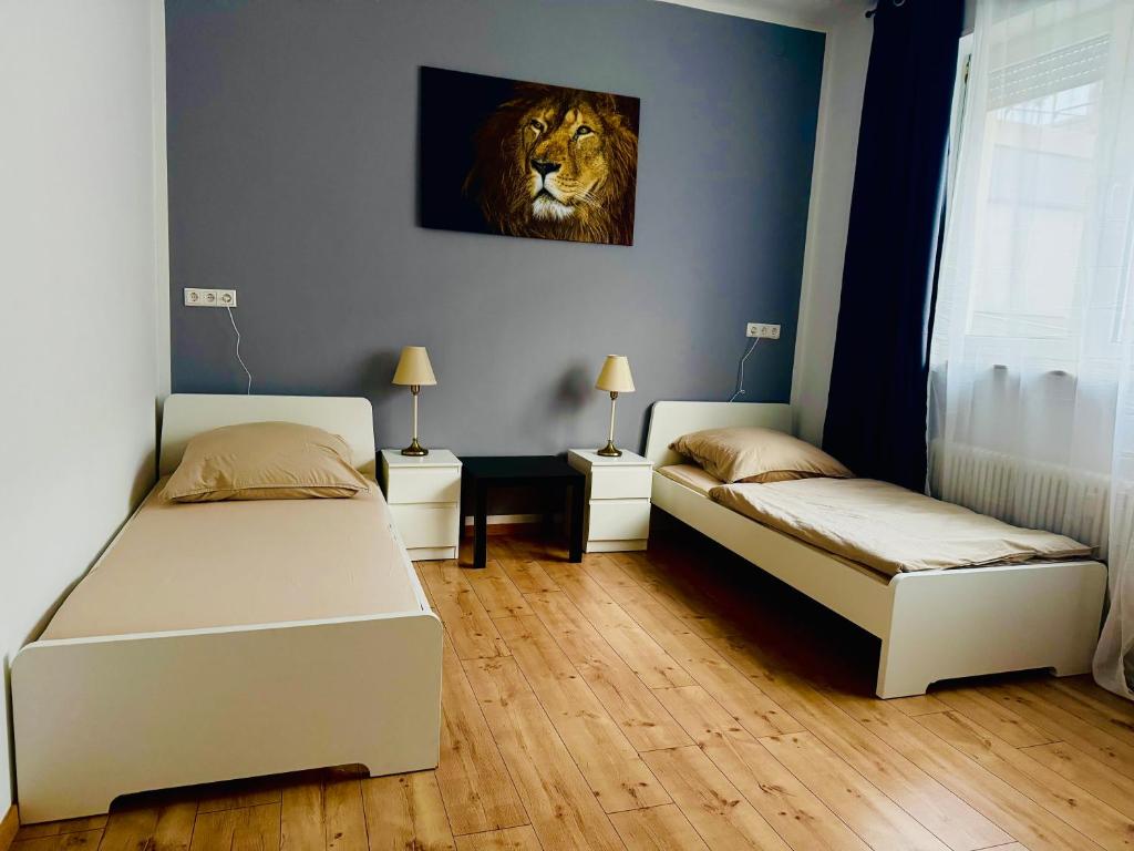 Postel nebo postele na pokoji v ubytování Meyben Apartment Mannheim Küche, TV, Waschmachine