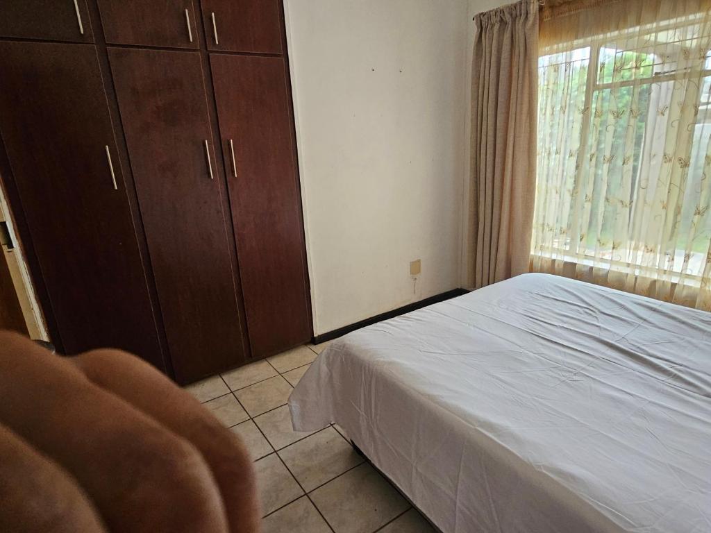 En eller flere senge i et værelse på The comfort