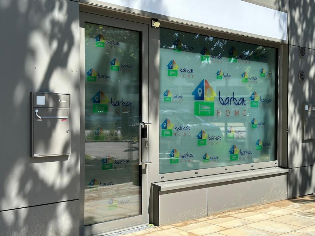 a store window with a sign on the side of it at Ferienwohnung im Hamburger Straße 134 in Hamburg