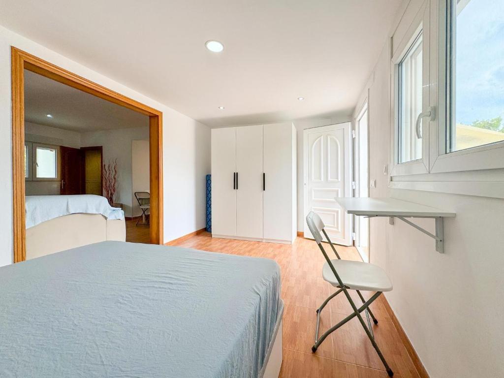 Ένα ή περισσότερα κρεβάτια σε δωμάτιο στο Villa Yenny Reus