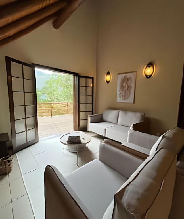 Et opholdsområde på Chalé Vermont | Privacidade & Sofisticação