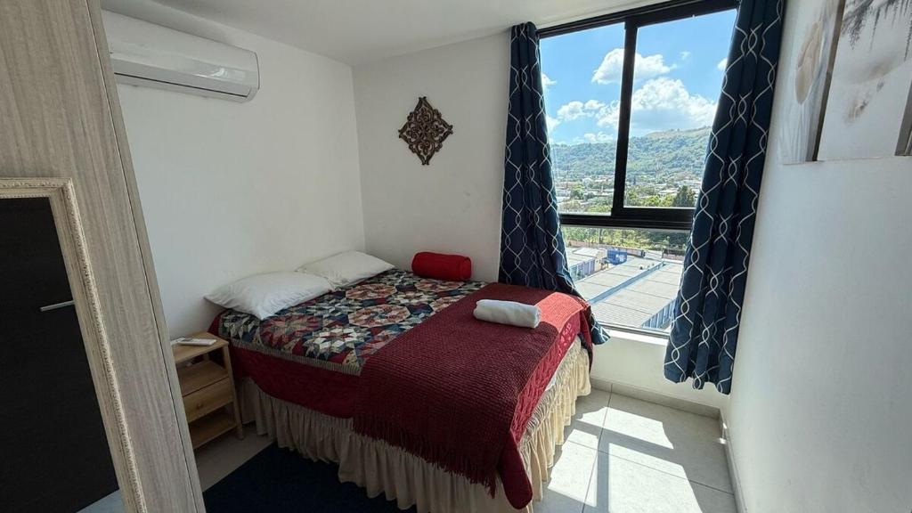 Ένα ή περισσότερα κρεβάτια σε δωμάτιο στο Valley Views Flat Santa Tecla