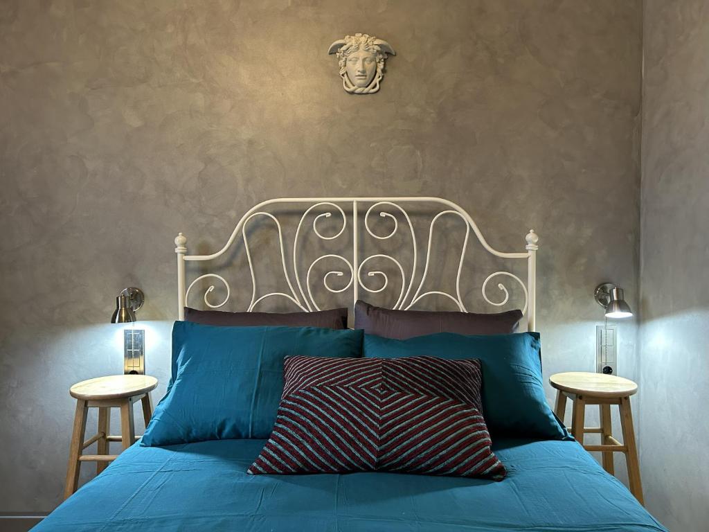 Postel nebo postele na pokoji v ubytování RedDoor Apartaments