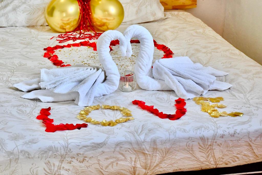 Ένα ή περισσότερα κρεβάτια σε δωμάτιο στο La Villa du Sommet