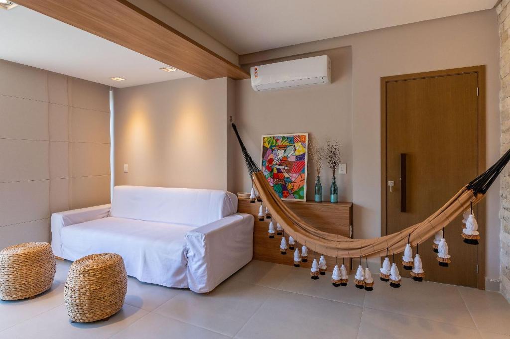 En eller flere senge i et værelse på Luxo e Tranquilidade na Ponta do Mutá-Pé na areia