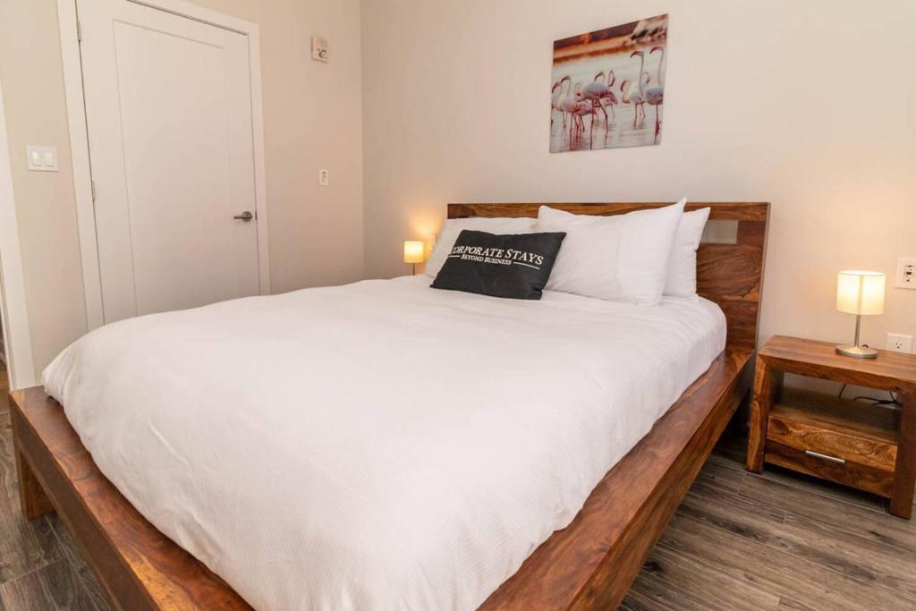 Llit o llits en una habitació de Corporate Stays Killick 2 Bedroom