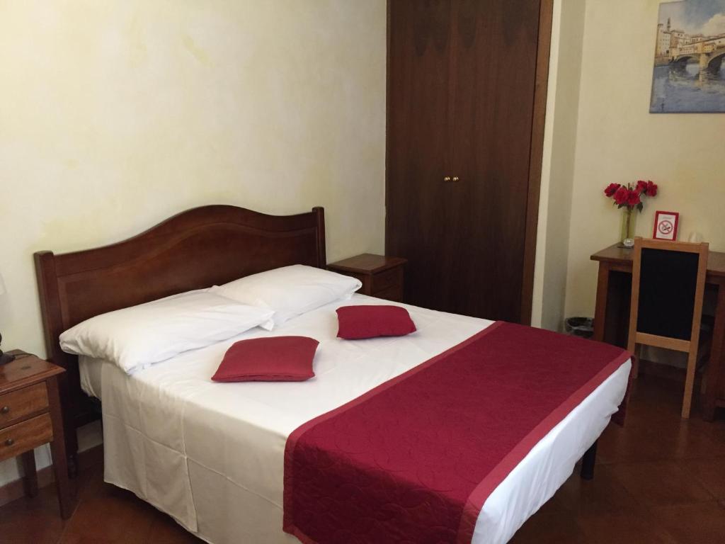 Posteľ alebo postele v izbe v ubytovaní Hotel Bologna