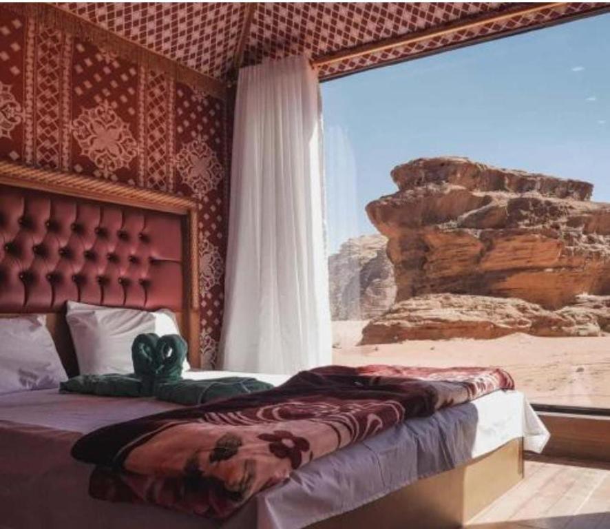 Ένα ή περισσότερα κρεβάτια σε δωμάτιο στο Golden Sand Oasis