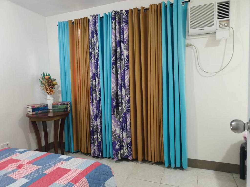 Ein Bett oder Betten in einem Zimmer der Unterkunft Balai Hermioni