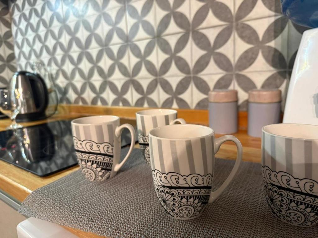 Casa en Roldán 2 habitacionesにあるコーヒーまたはお茶