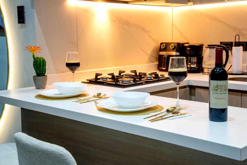 Příslušenství pro přípravu čaje a kávy v ubytování Apartment suite Encanto de Caldas