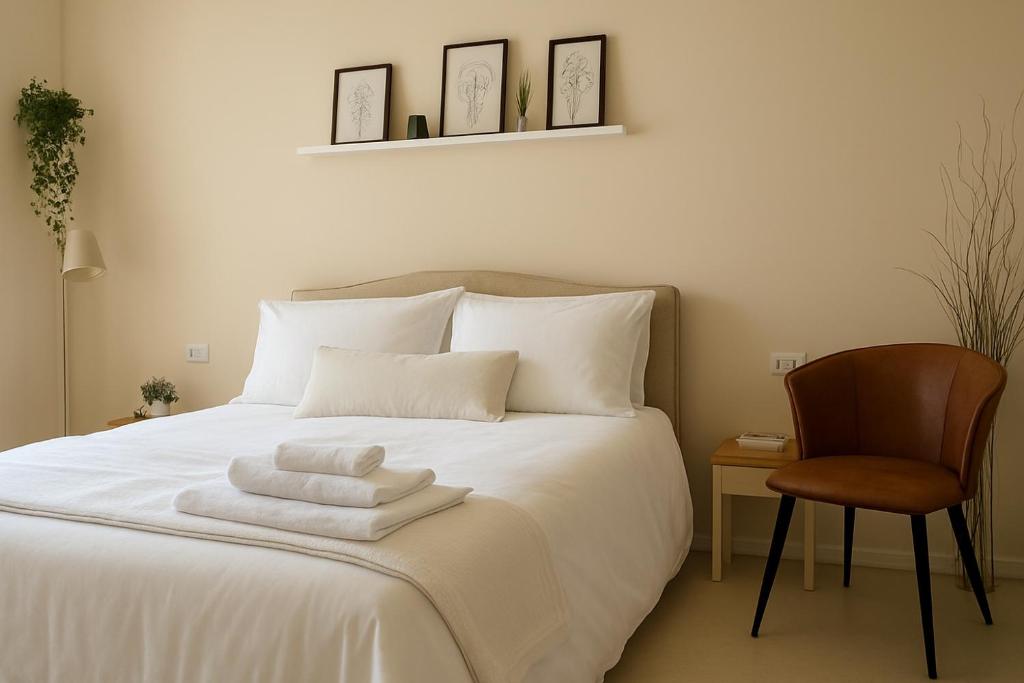 Ένα ή περισσότερα κρεβάτια σε δωμάτιο στο onde dell'etna 12