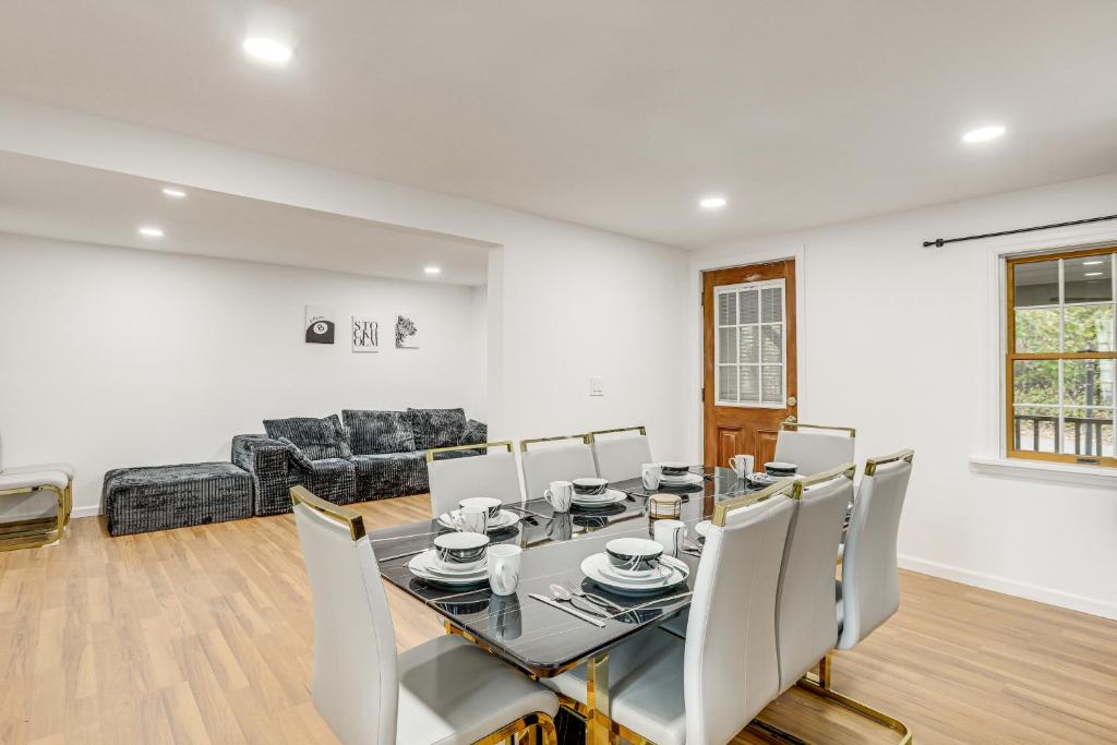 a dining room with a table and chairs at Updated Getaway with Sauna and Yard in Bloomsbury! in Port Warren