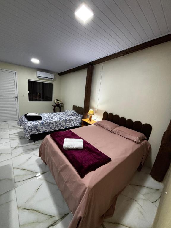 Et tv og/eller underholdning på Casa Familiar da Mari