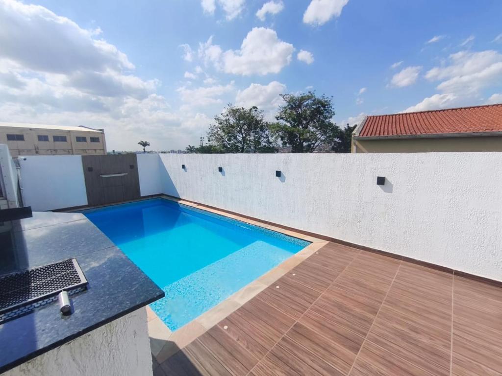 Bazén v ubytování Olegário Bueno 230 nebo v jeho okolí