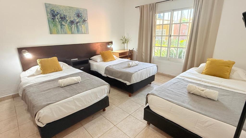 Postel nebo postele na pokoji v ubytování G7 Confortable Monoambiente Triple con Cochera