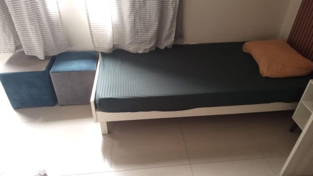 Voodi või voodid majutusasutuse Apartamento bem localizado toas